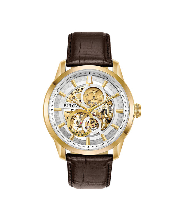 Bulova watch with gold case and brown leather strap on a white background