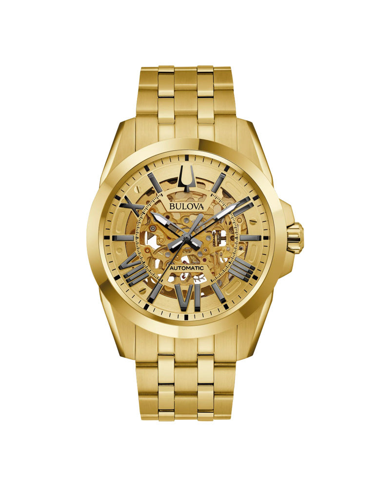 Gold Bulova watch with a white background
