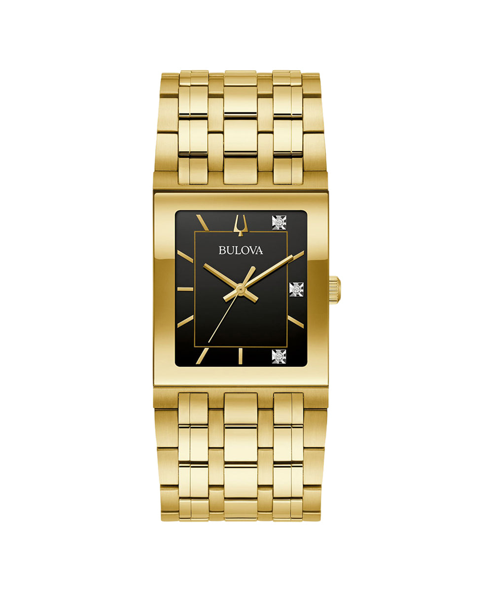 Gold watch with black face on a white background