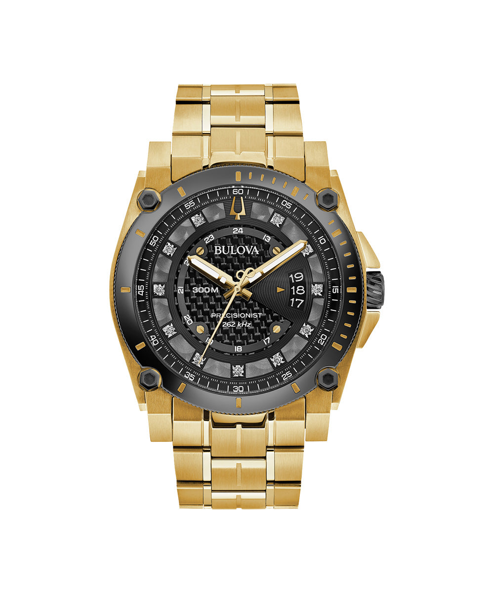 Gold and black Bulova watch on a white background