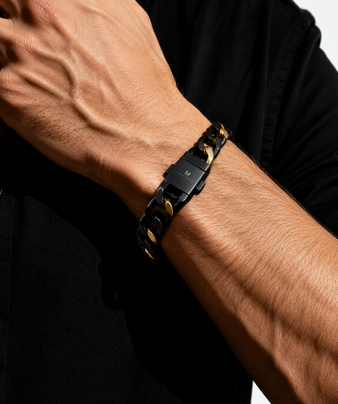 Linknlock curb chain bracelet on a wrist with a dark background