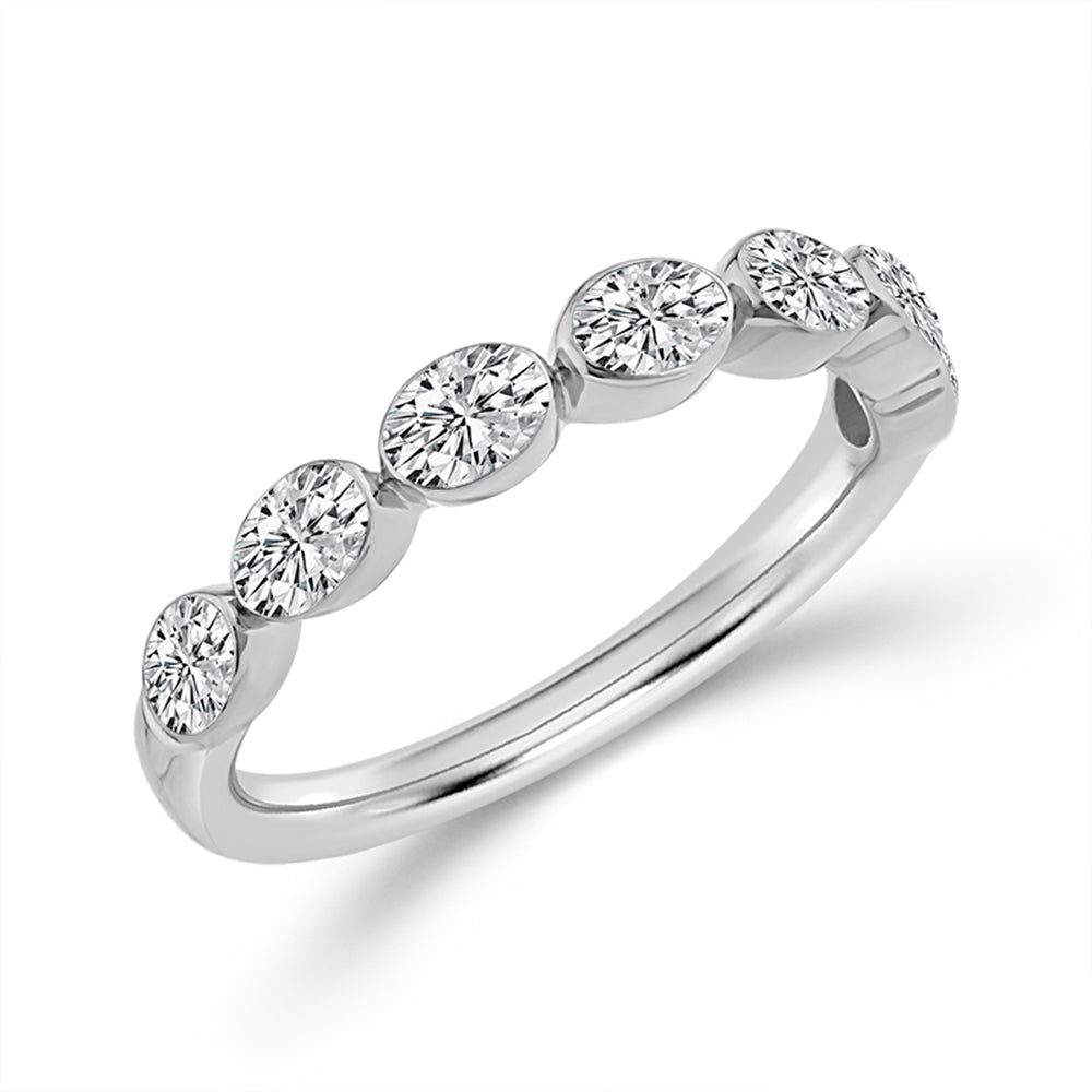 A silver diamond band ring featuring five round-cut diamonds set in a polished silver-colored band, shown on a clean white background.