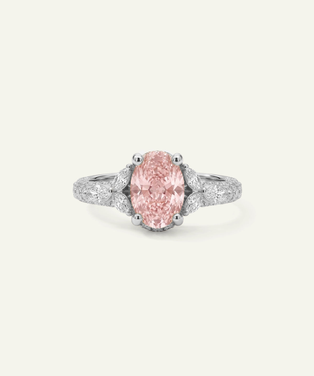 A white gold ring featuring a large oval-cut pink gemstone center stone, flanked by marquise-cut diamond accents and a pavé diamond band on a plain off-white background.