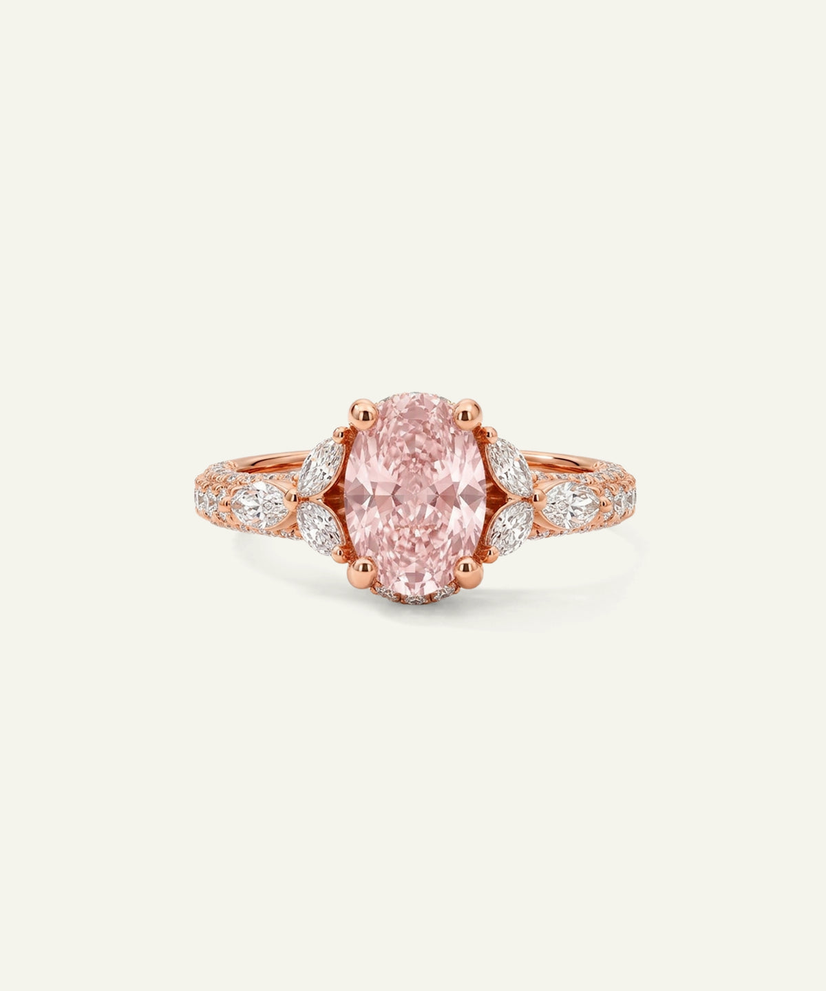 A rose gold ring featuring a large oval-cut pink gemstone center stone, flanked by marquise-cut diamond accents and a pavé diamond band on a plain off-white background.