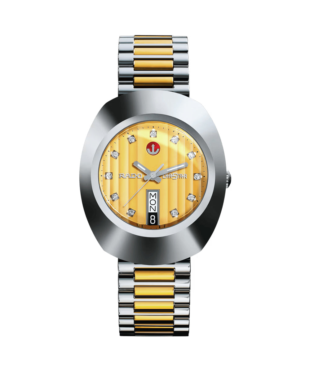 Watch with a gold and silver two-tone band on a white background