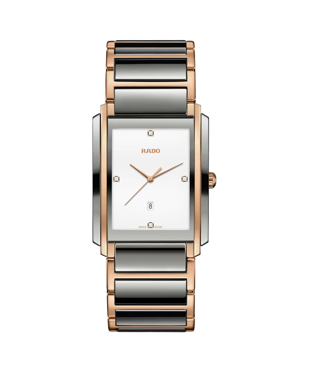 Rado watch with rose gold and silver band on a white background
