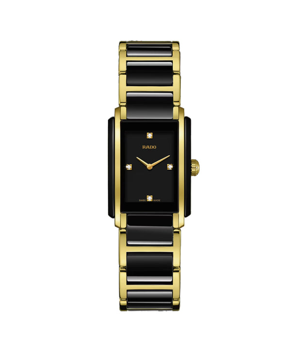 Watch with black and gold band on a white background
