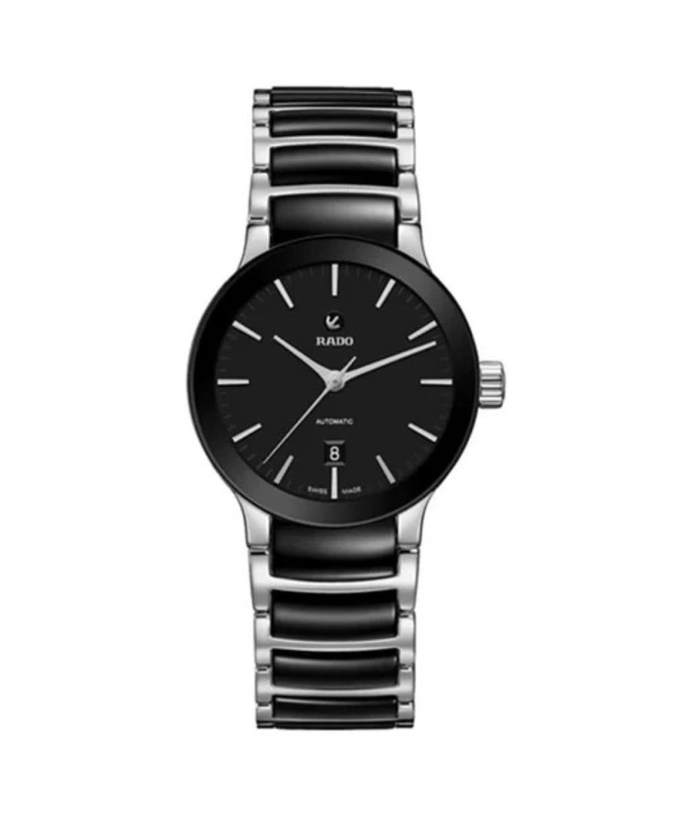 Watch with black and silver band on a white background