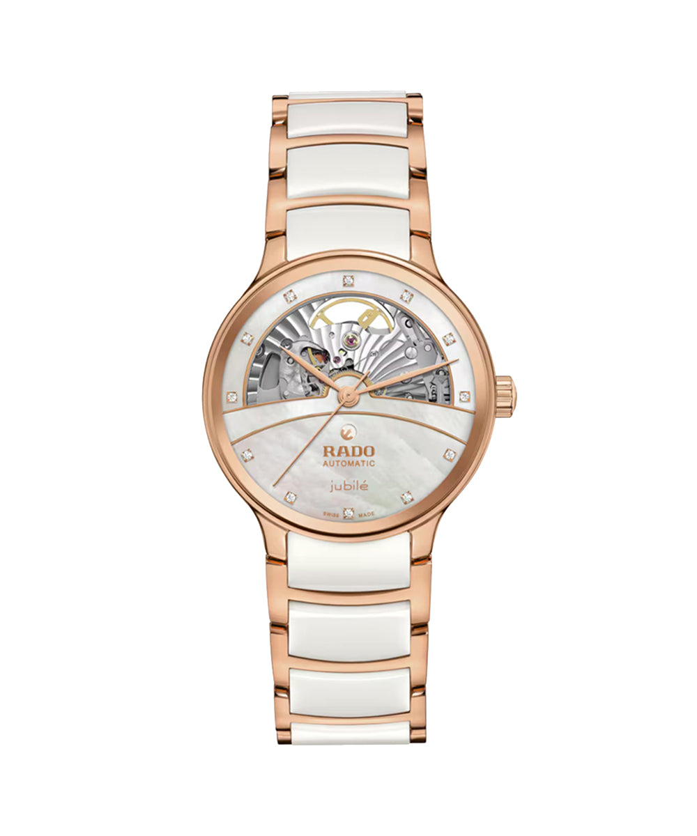 Rose gold and white ceramic watch with Rado brand on a white background