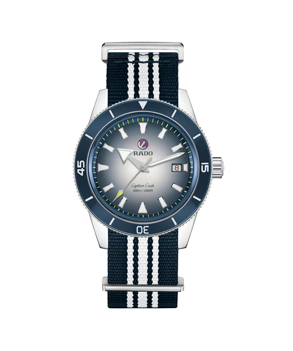 Watch with blue strap and silver case on a white background