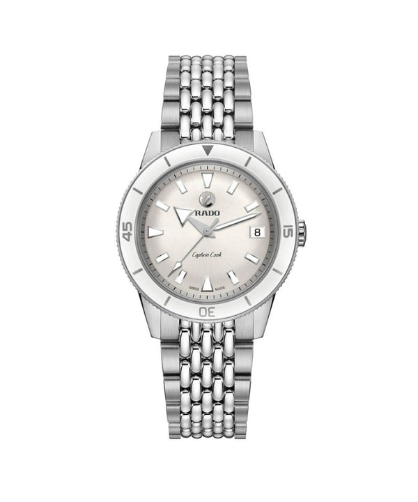 Silver watch with a white face on a white background