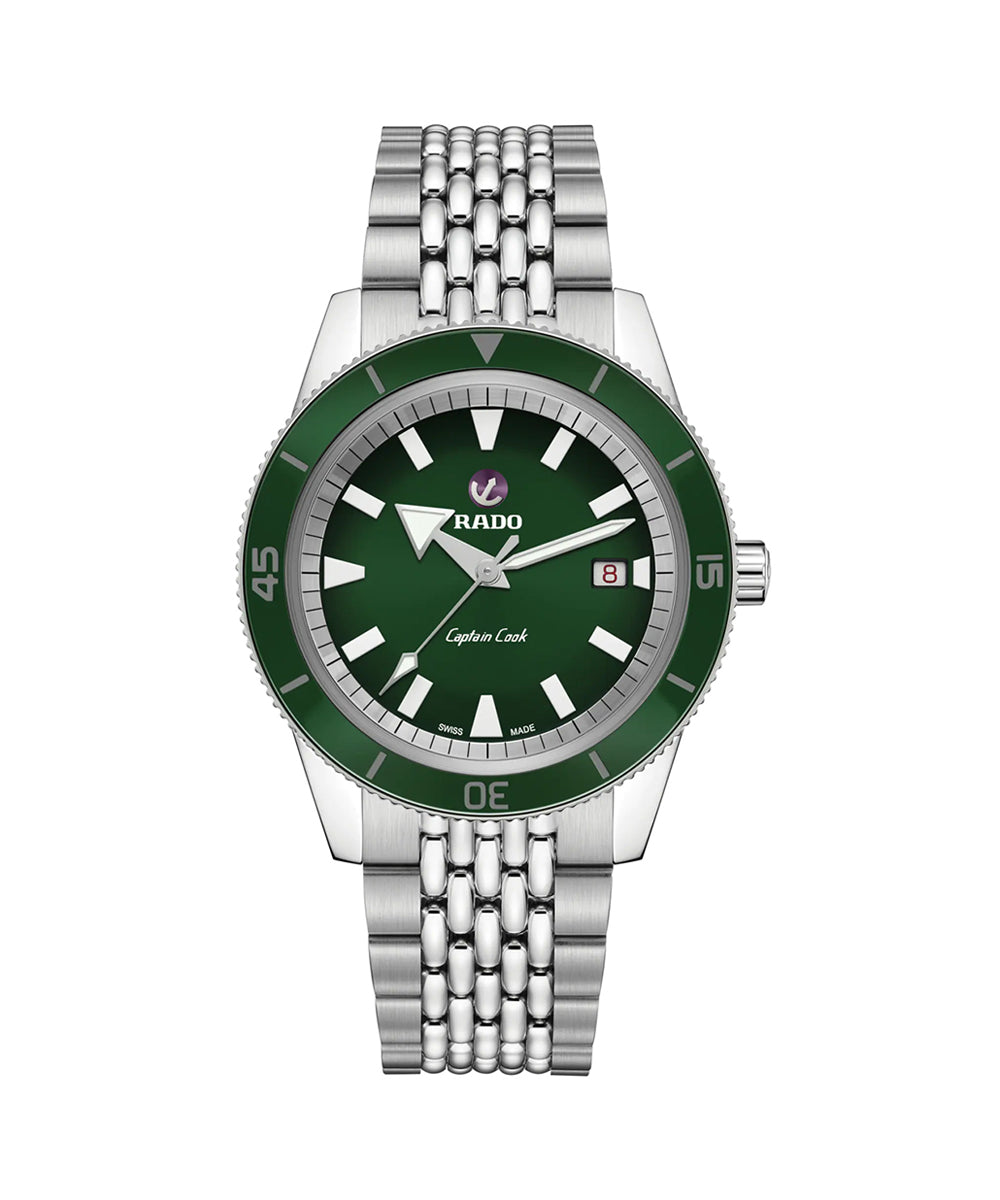Green watch with silver bracelet on a white background