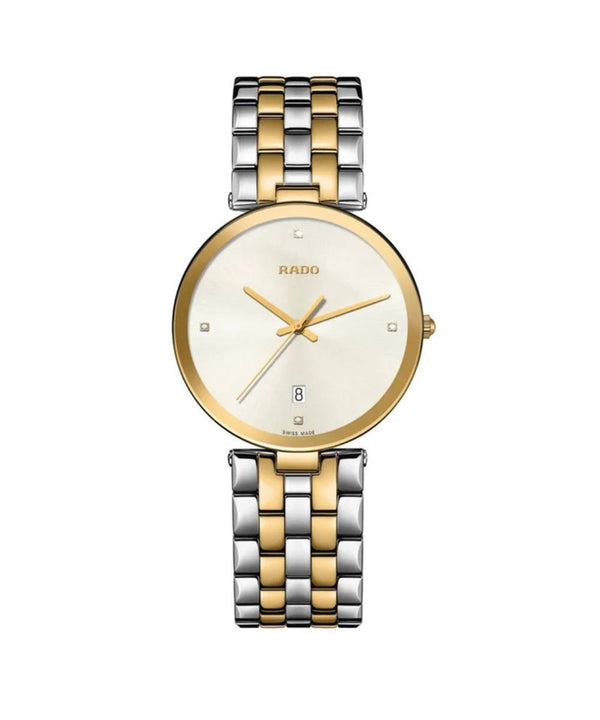 Two-tone watch with gold and silver band on a white background