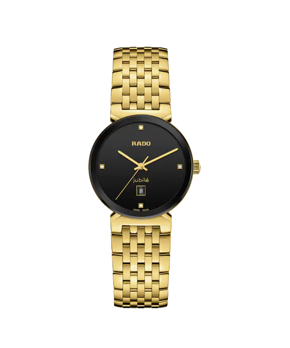 Gold watch with black face on a white background