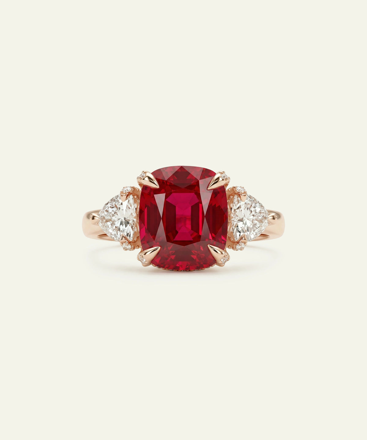 A rose gold ring featuring a large cushion-cut emerald-cut ruby center stone, flanked by two small round-cut diamonds, set against a solid off-white background.