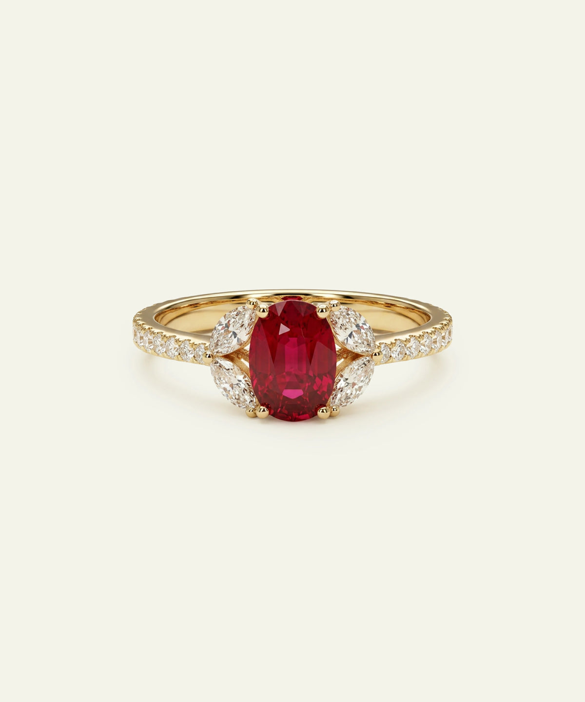 A yellow gold ring featuring an oval-cut red ruby center stone, surrounded by diamond halo accents and a diamond-set band, set against a solid off-white background.