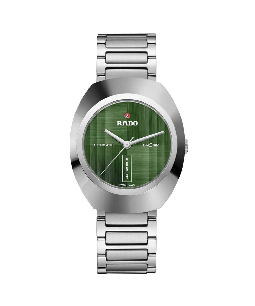 Silver Rado watch with a green face on a white background