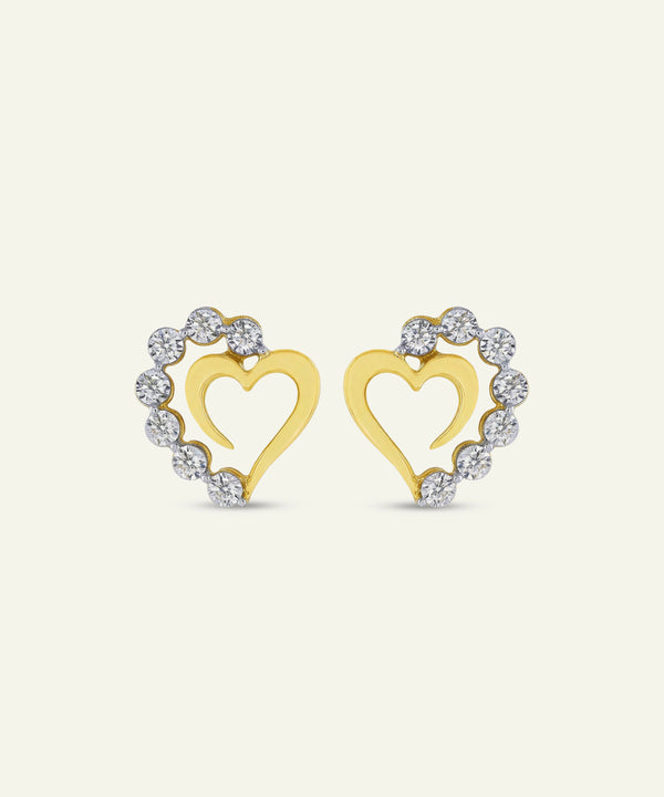 Pair of gold heart-shaped earrings with diamond accents on a white background