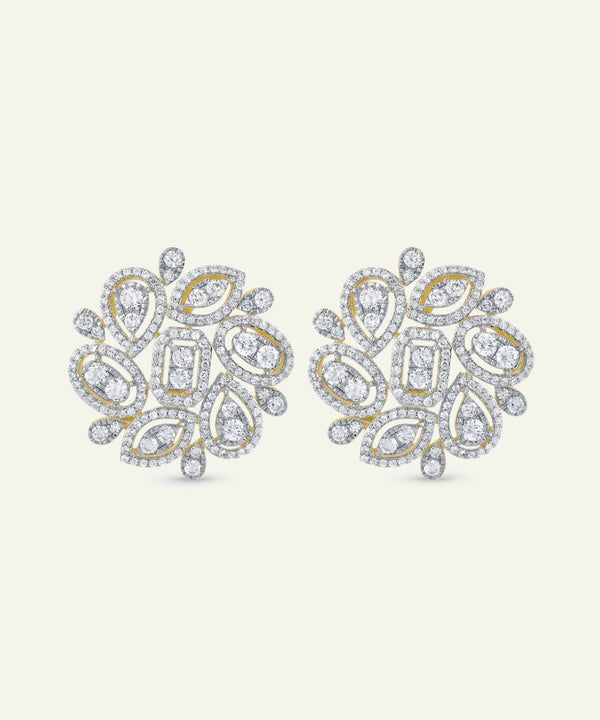 Pair of diamond earrings on a light gray background