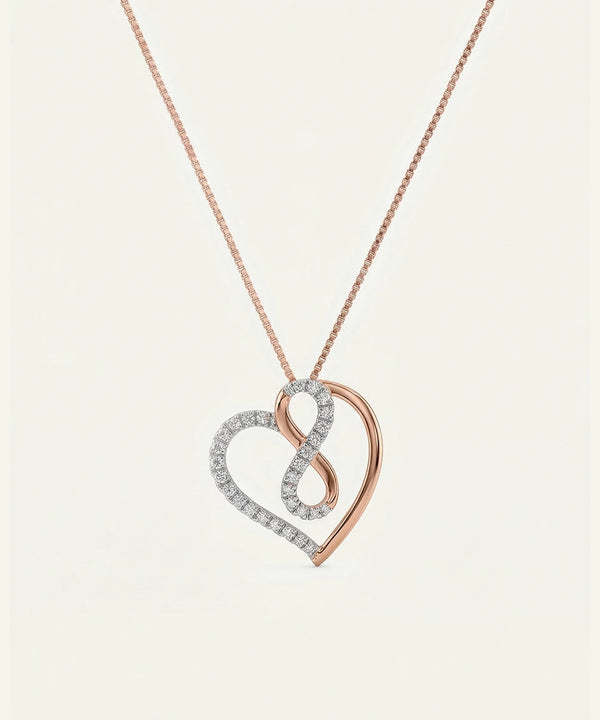 Rose gold and silver heart-shaped pendant necklace on a light beige background