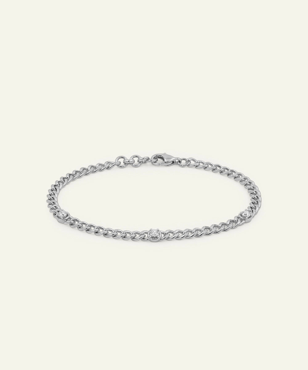 Silver chain bracelet on a white background