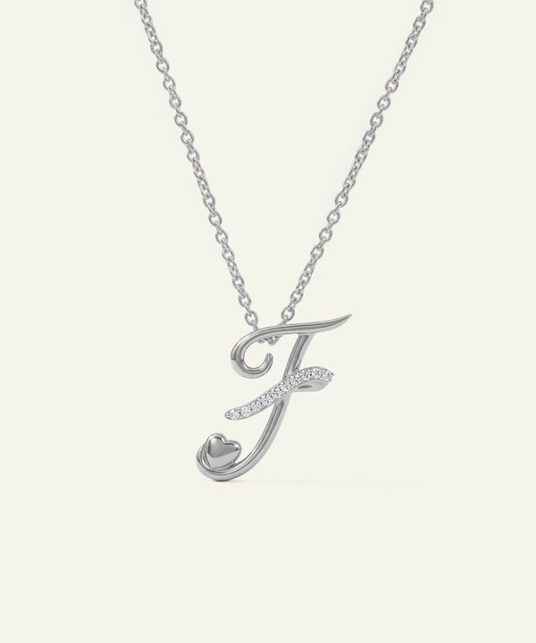 Silver necklace with a letter 'J' pendant on a white background