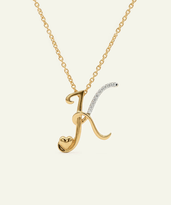 Gold necklace with a unique pendant on a white background