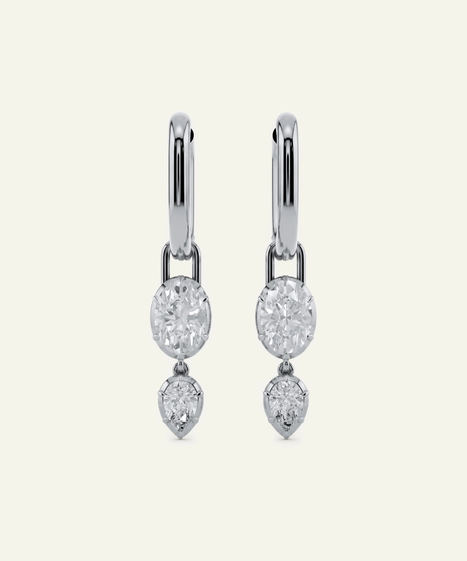 Pair of diamond earrings on a white background