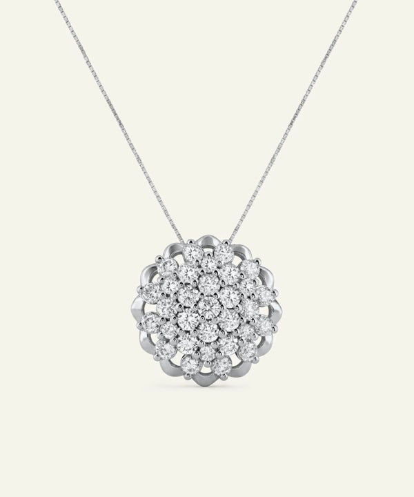 Silver necklace with a floral diamond pendant on a white background