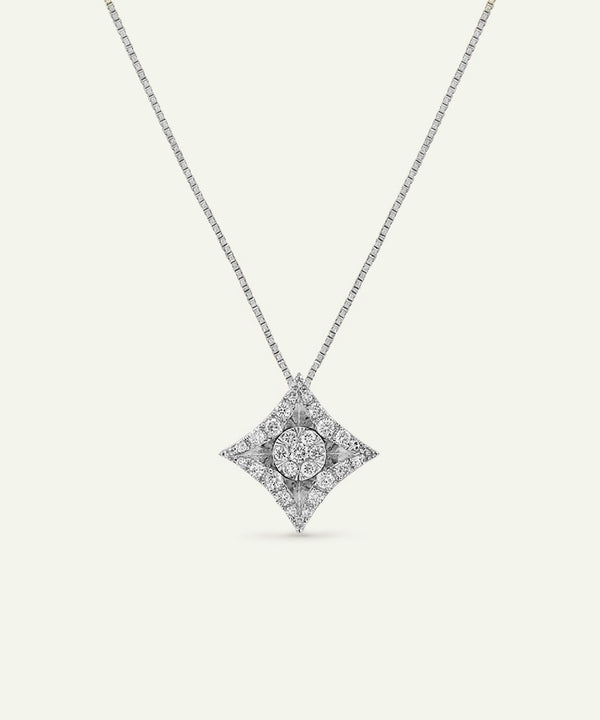 Diamond necklace with a star-shaped pendant on a light gray background