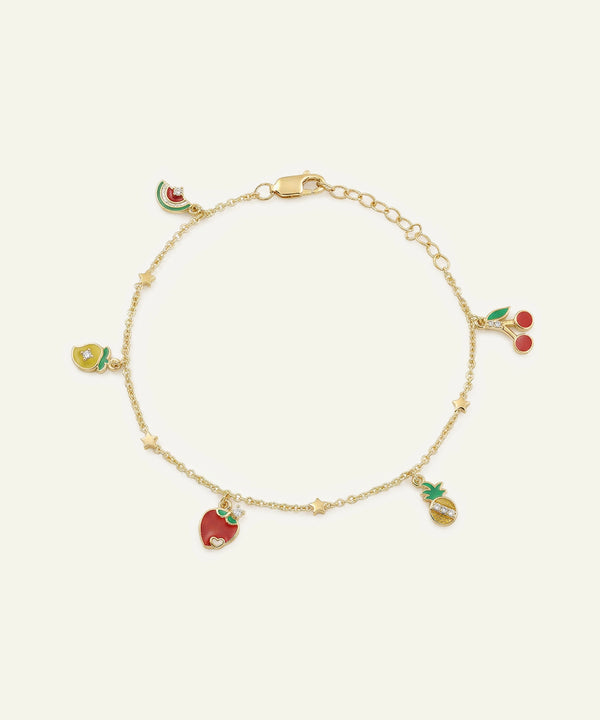 Gold bracelet with colorful fruit charms on a white background