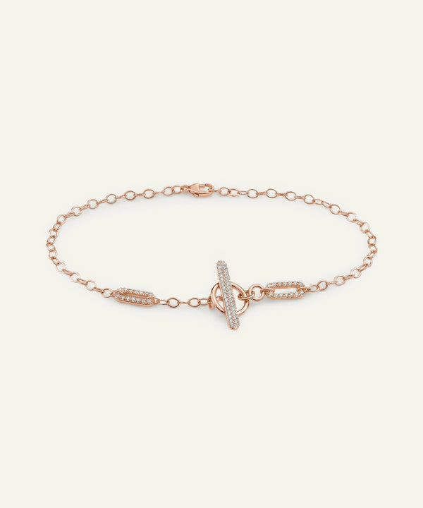 Silver bracelet with a clasp on a white background