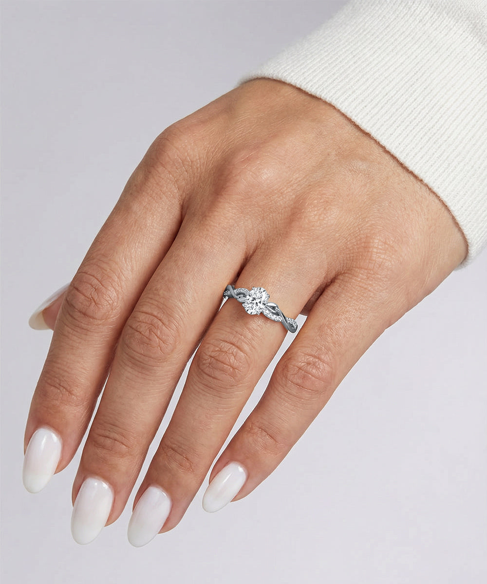 Man wearing a wide gold wedding band featuring two parallel rows of channel-set diamonds in a sleek, polished step-edge setting, styled on a hand.