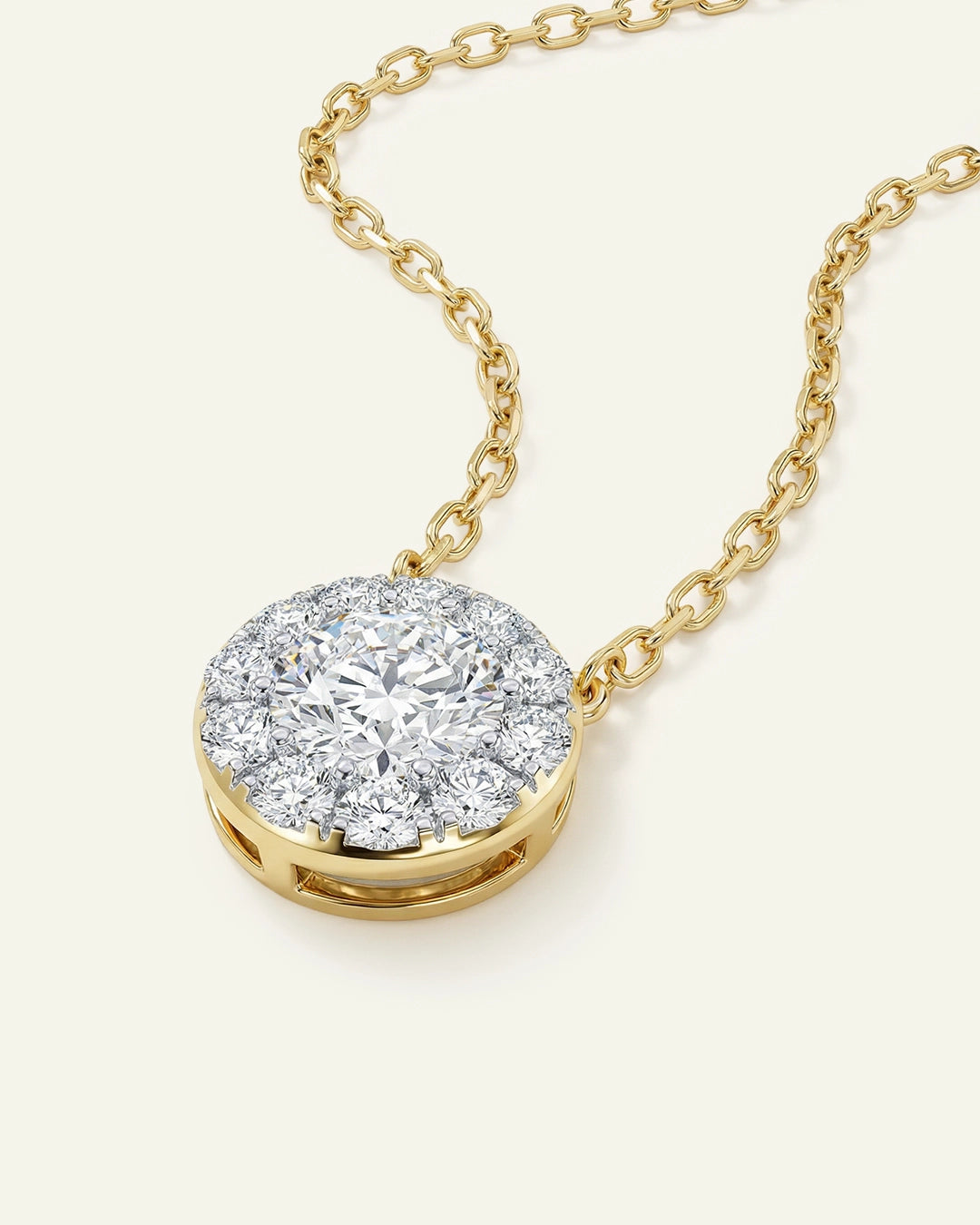 Gold necklace with a diamond pendant on a white background