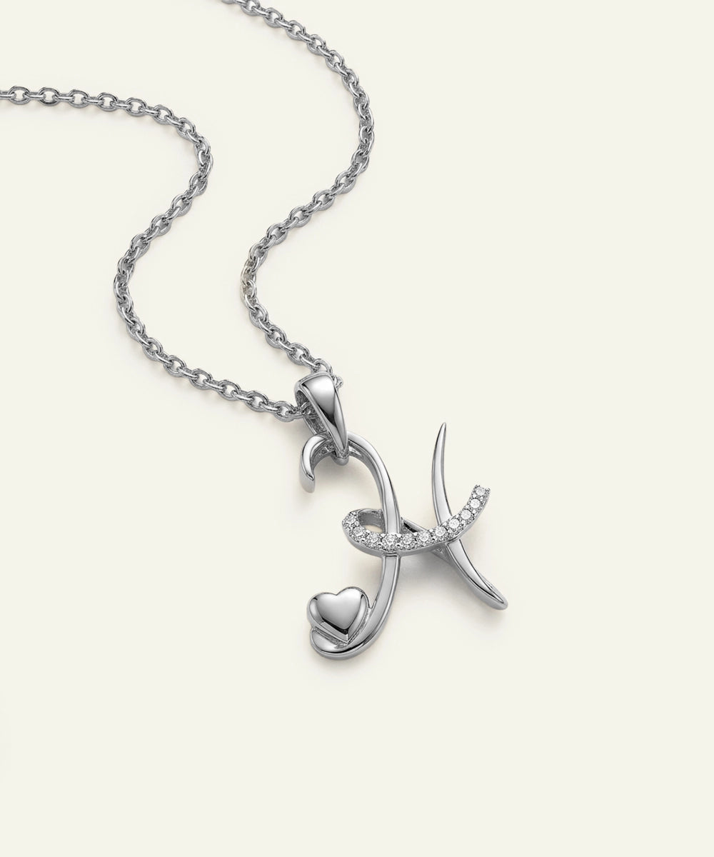 Silver necklace with a unique pendant on a white background