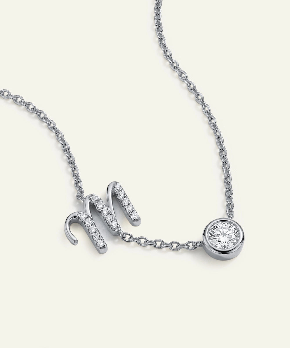 Silver necklace with a pendant on a white background