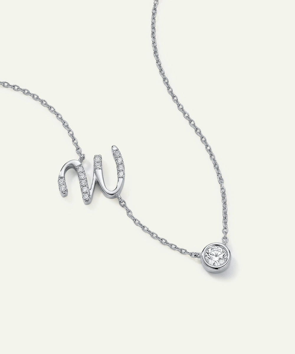 Silver necklace with a unique pendant on a white background