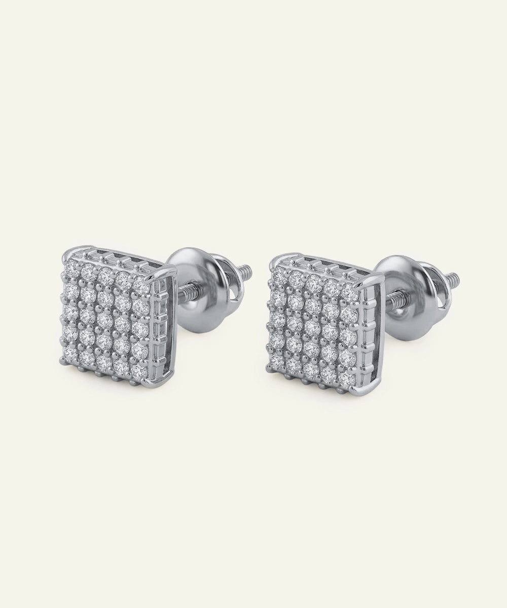 Pair of silver square stud earrings with clear gemstones on a white background